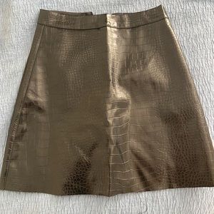 Patent snakeskin mini skirt